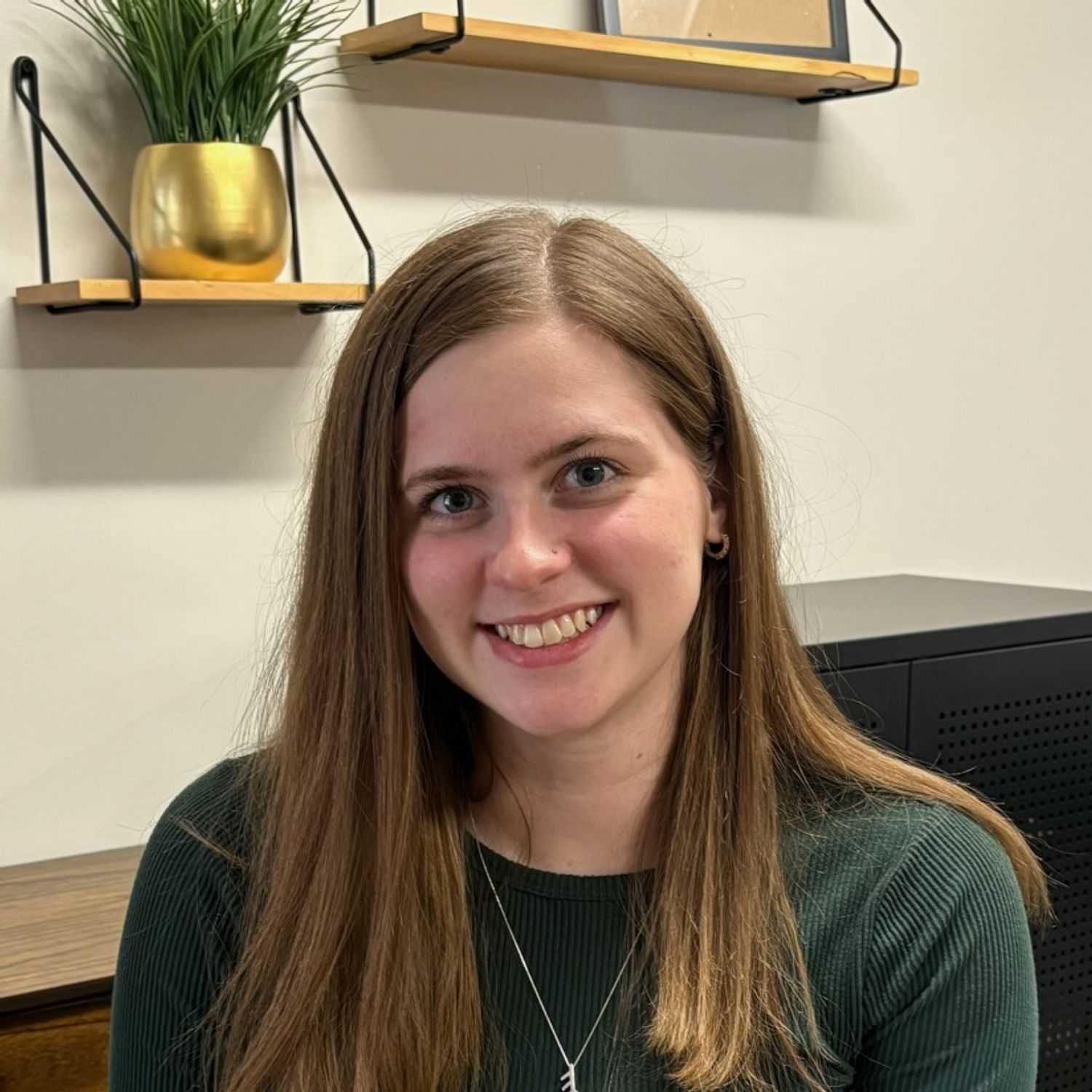 Portrait of Madison's Studio, a professional stylist at Integrity Hair Studios, showcasing their expertise and style.